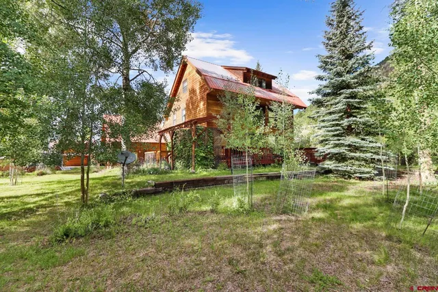a view of a balcony with furniture