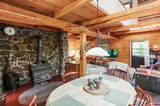 a dining room with furniture and a table