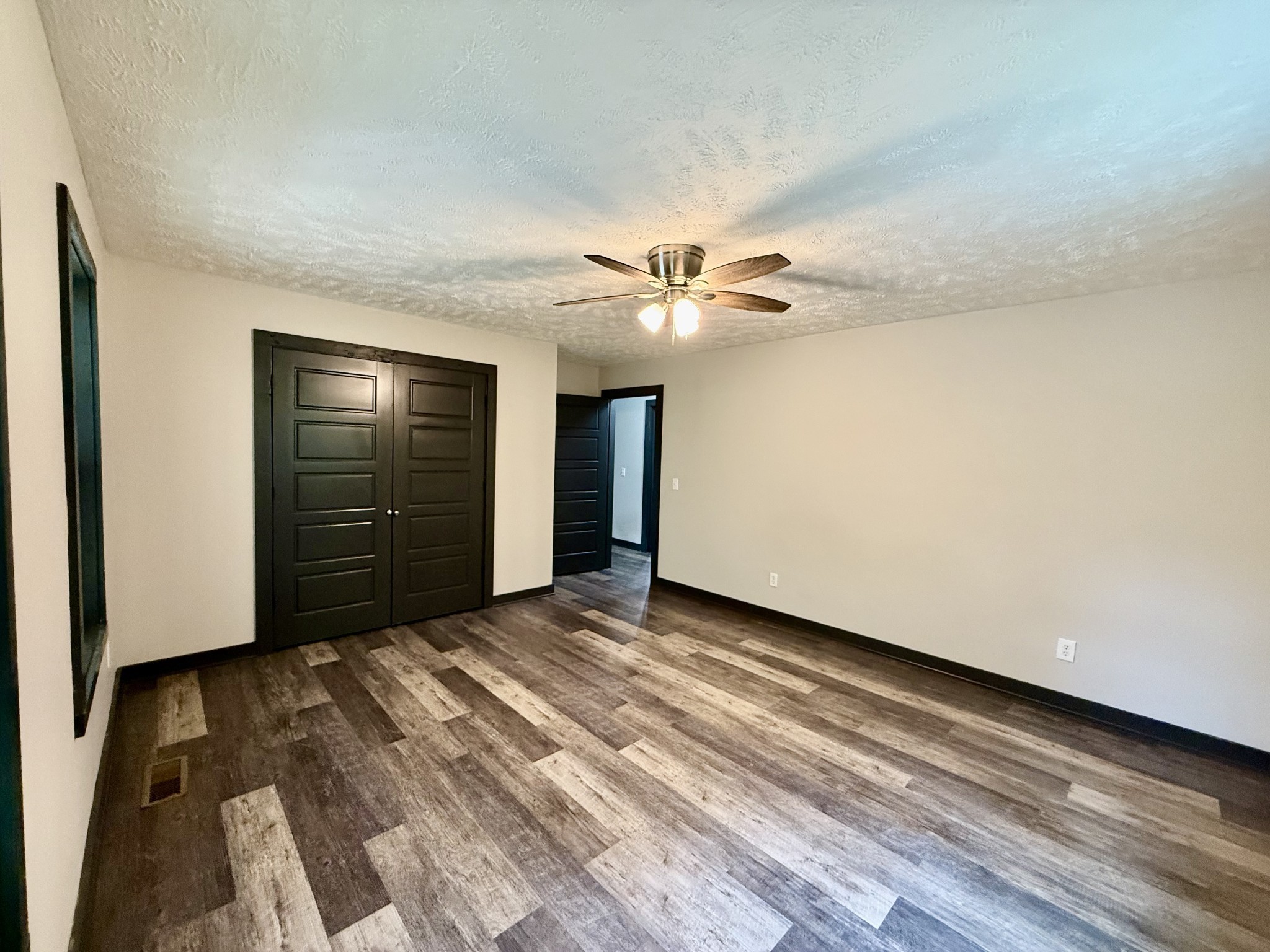 778 Jones Hollow Road Woodbury, TN 37190 - Photo 11 of 19 a view of a livingroom with a ceiling fan
