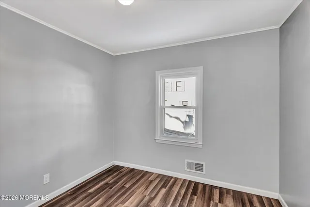 a view of a room that has a window in it