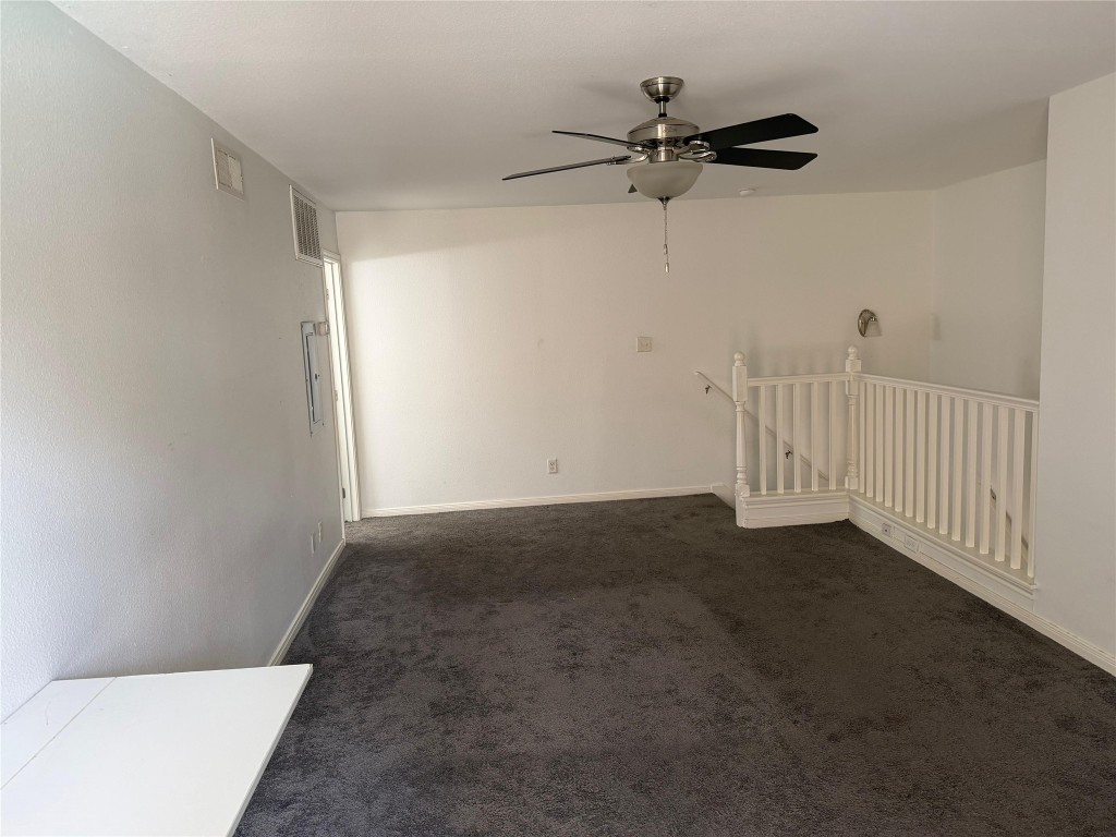 3600 Jeanetta Street, Unit 804 Houston, TX 77063 - Photo 9 of 26 a view of a room with a ceiling fan and hardwood floor