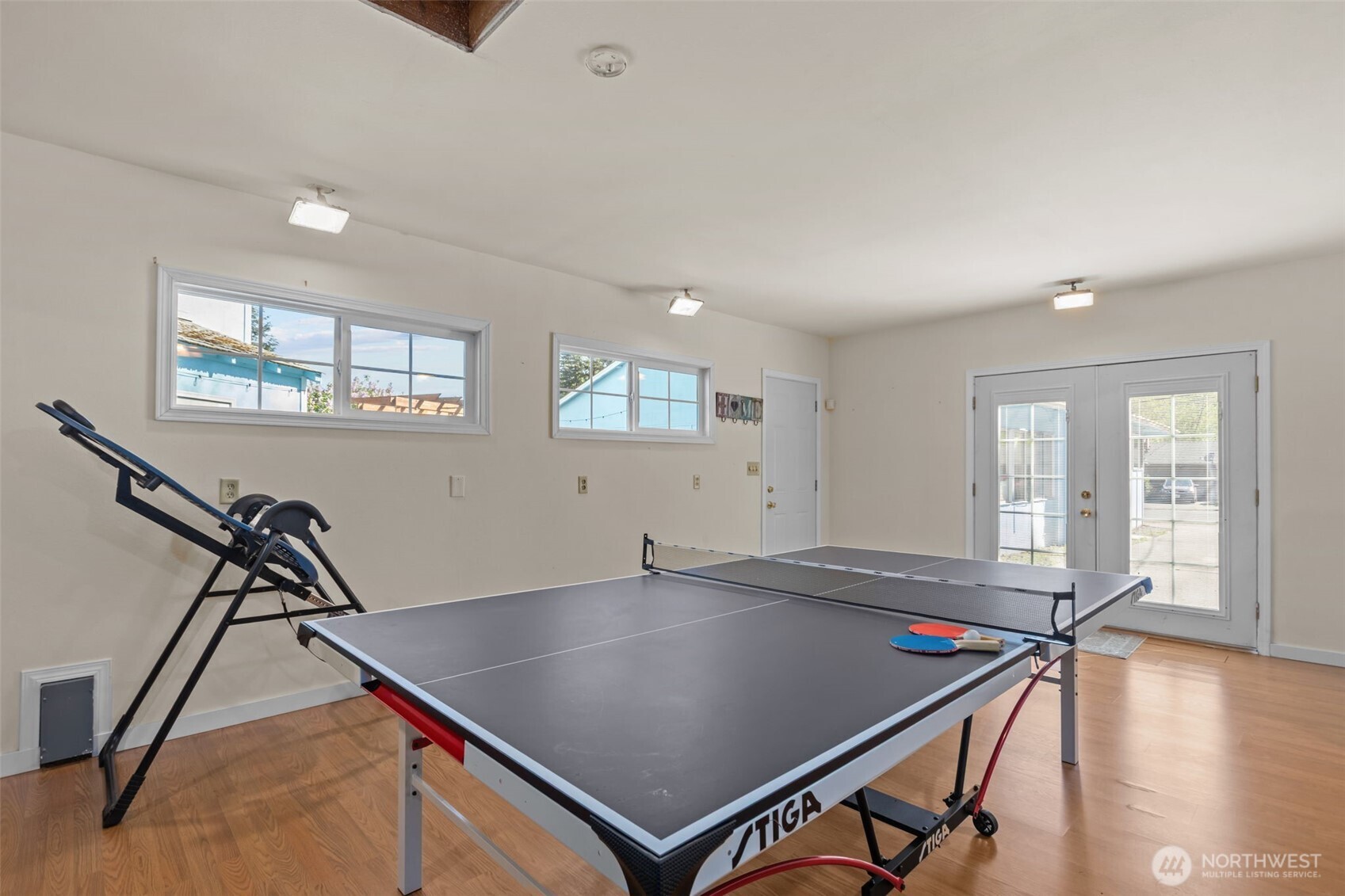 16022 126th Avenue Southeast Renton, WA 98058 - Photo 25 of 35 a view of a room with gym equipment