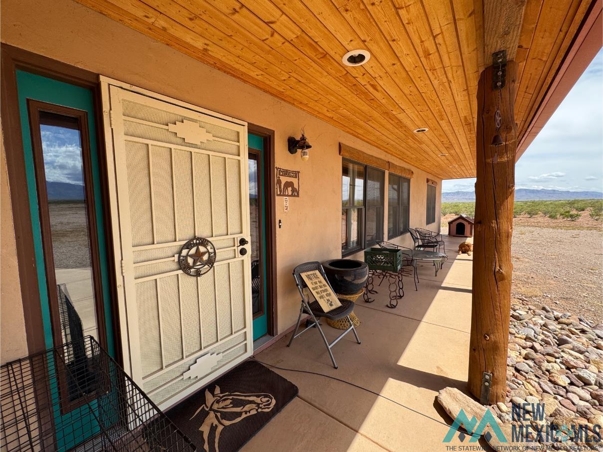 33 R Bar Road Rodeo, NM 88056 - Photo 7 of 20 Covered front patio area.