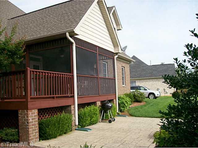 5700 Mabe Drive Oak Ridge, NC 27310 - Photo 16 of 16 Patio/Deck. Extra space to play or entertain outdoors.