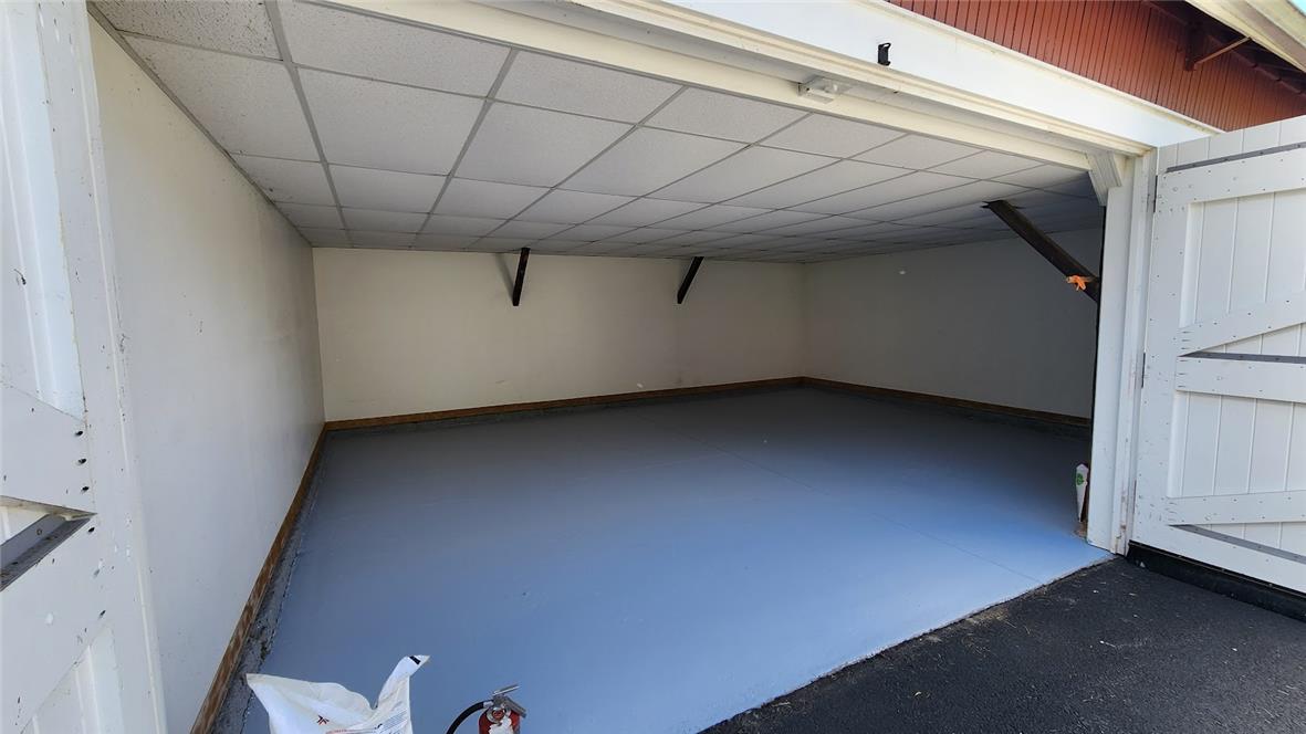4912 Shankweiler Road Orefield, PA 18069 - Photo 62 of 74 Secure parking and ample storage await in this clean and functional garage space.
