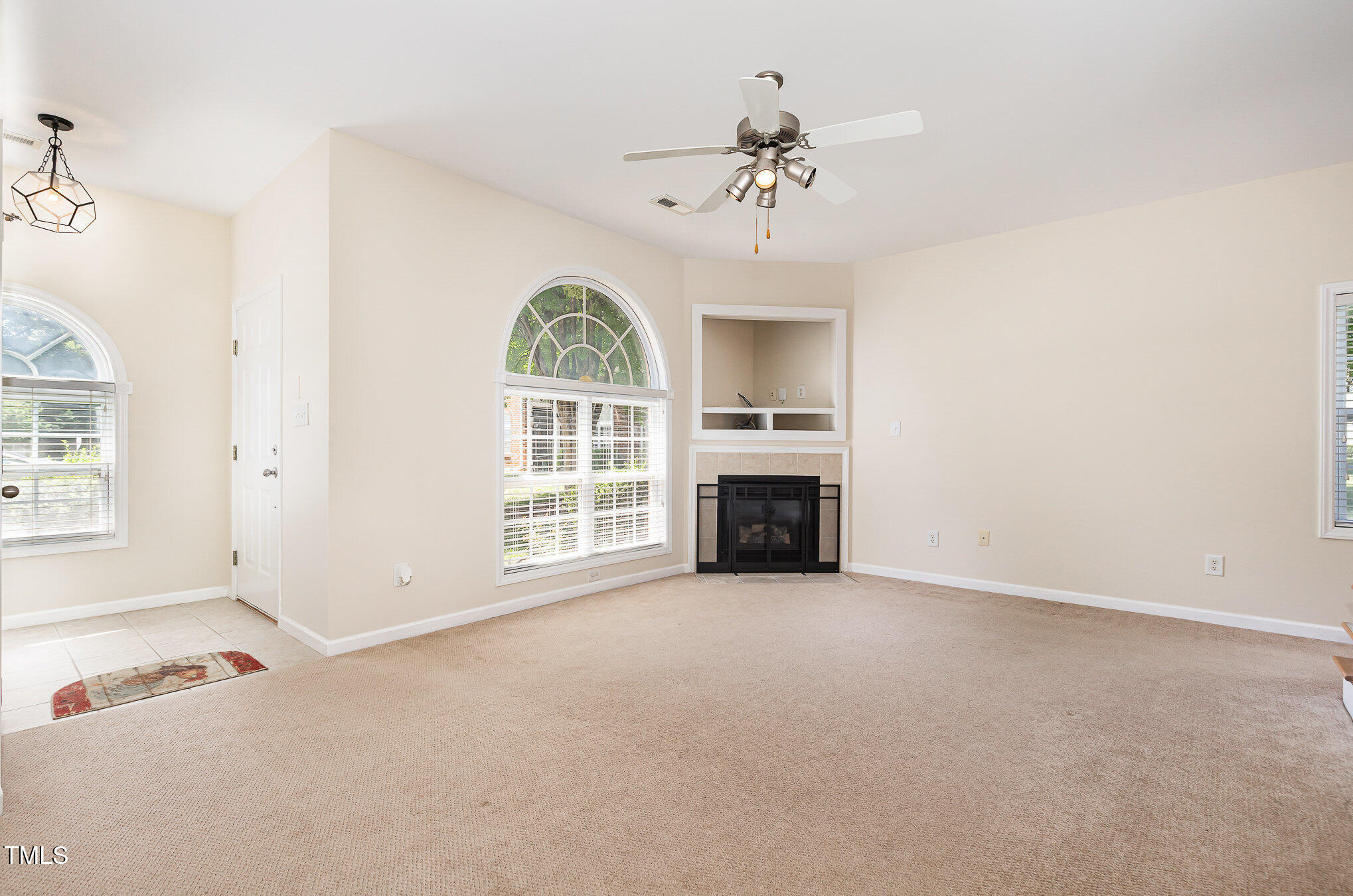 2111 Piney Brook Road, Unit 101 Raleigh, NC 27614 - Photo 4 of 39 Cozy Gas logs and TV niche