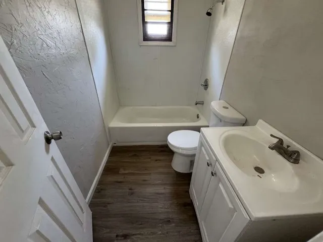 a bathroom with a sink and a bathtub