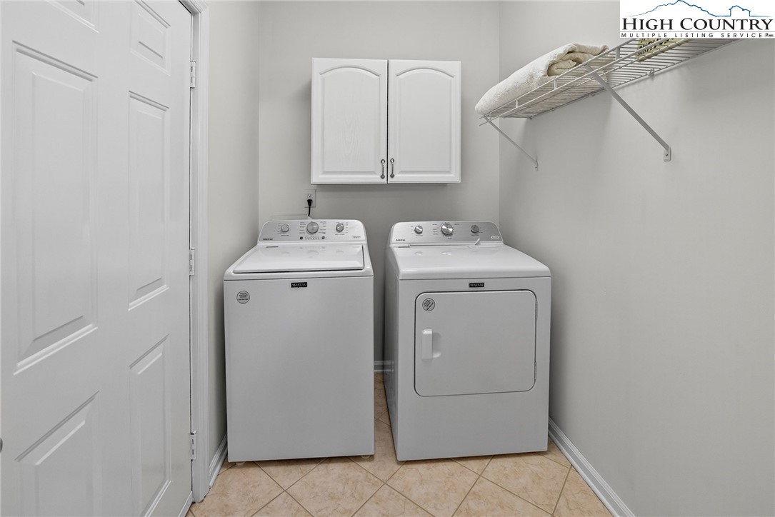 233 Lakeview Place, Unit D2 Jefferson, NC 28640 - Photo 26 of 49 a utility room with dryer and washer