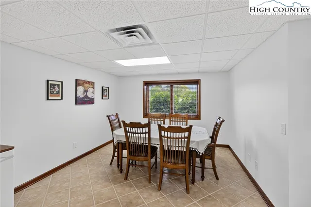 a kitchen with a stove sink and refrigerator