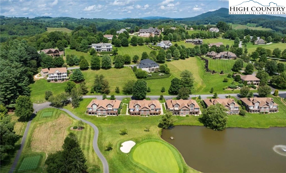 233 Lakeview Place, Unit D2 Jefferson, NC 28640 - Photo 47 of 49 an aerial view of a house with yard swimming pool and outdoor seating