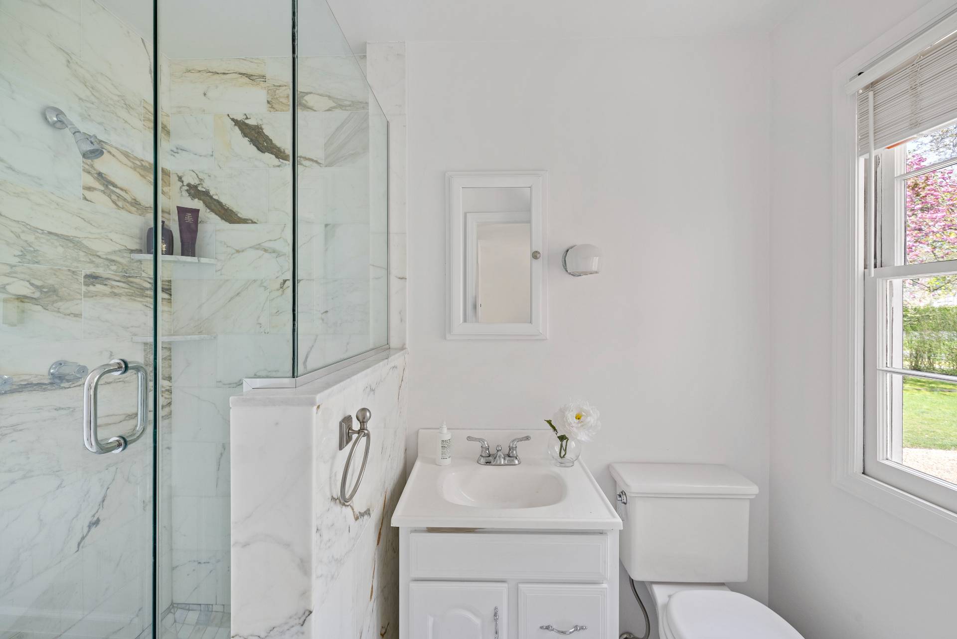96 Audubon Avenue Bridgehampton, NY 11932 - Photo 15 of 25 a bathroom with a sink toilet and shower