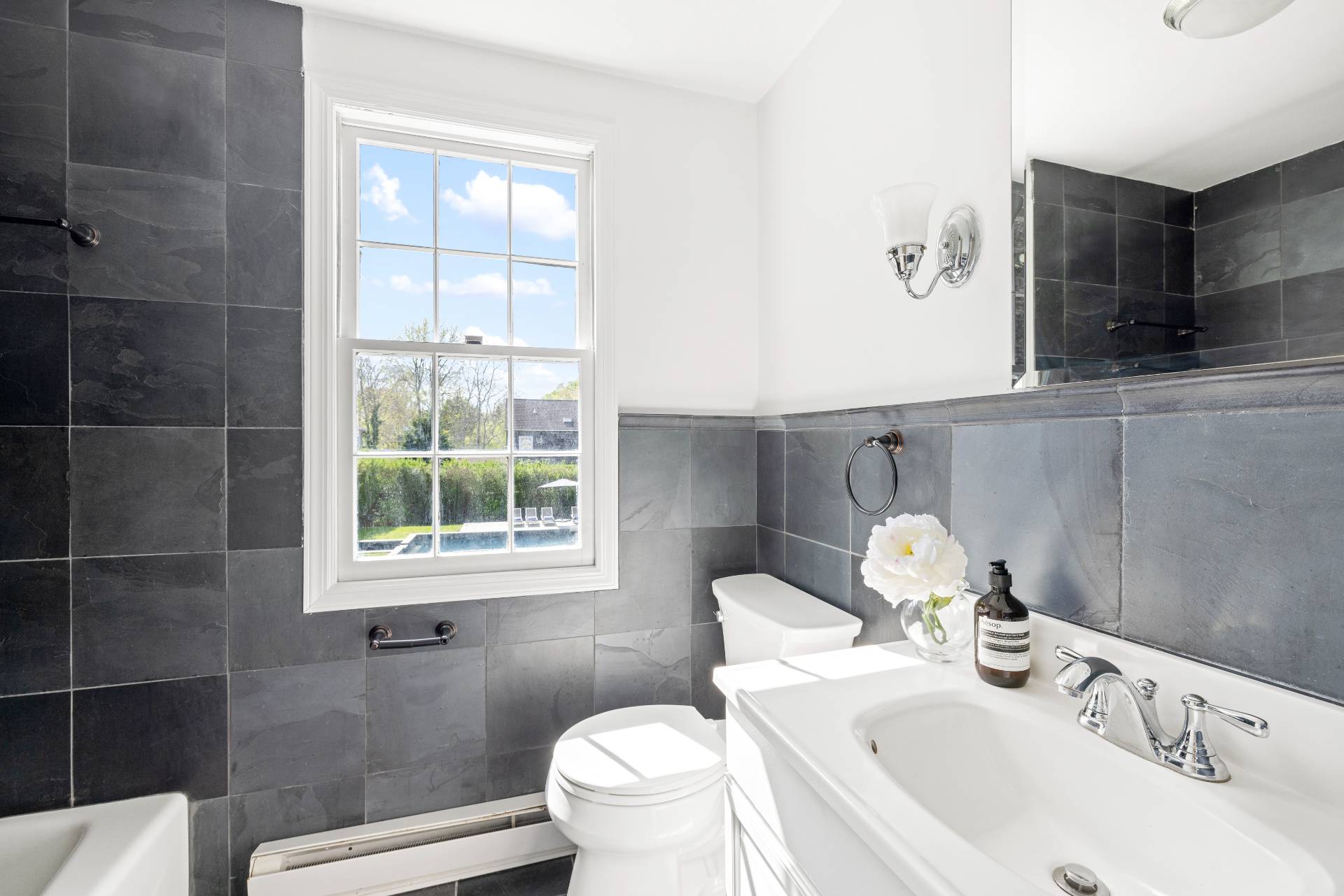 96 Audubon Avenue Bridgehampton, NY 11932 - Photo 17 of 25 a bathroom with a sink toilet and shower