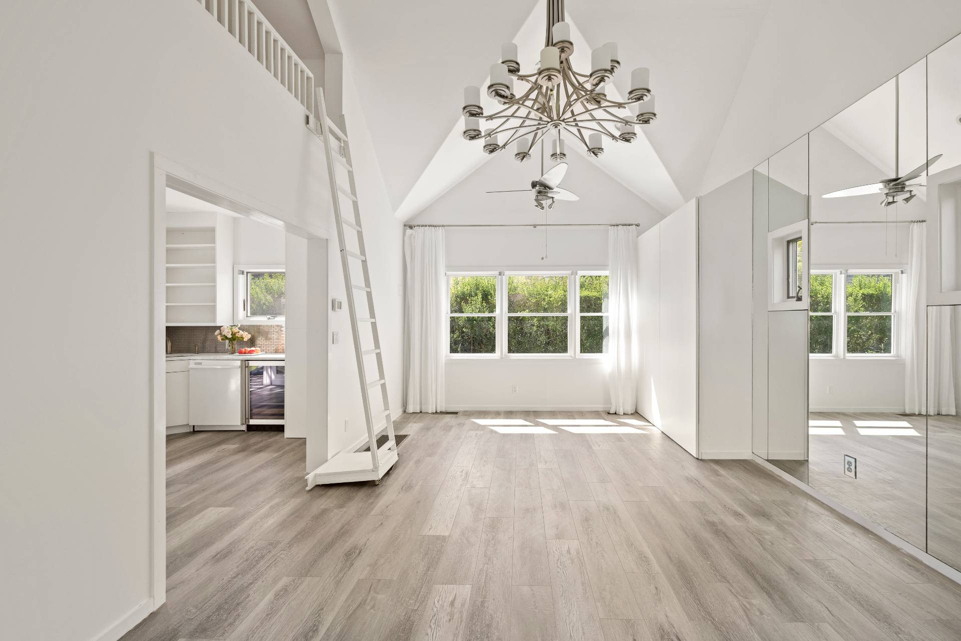 96 Audubon Avenue Bridgehampton, NY 11932 - Photo 20 of 25 wooden floor in an empty room with a window