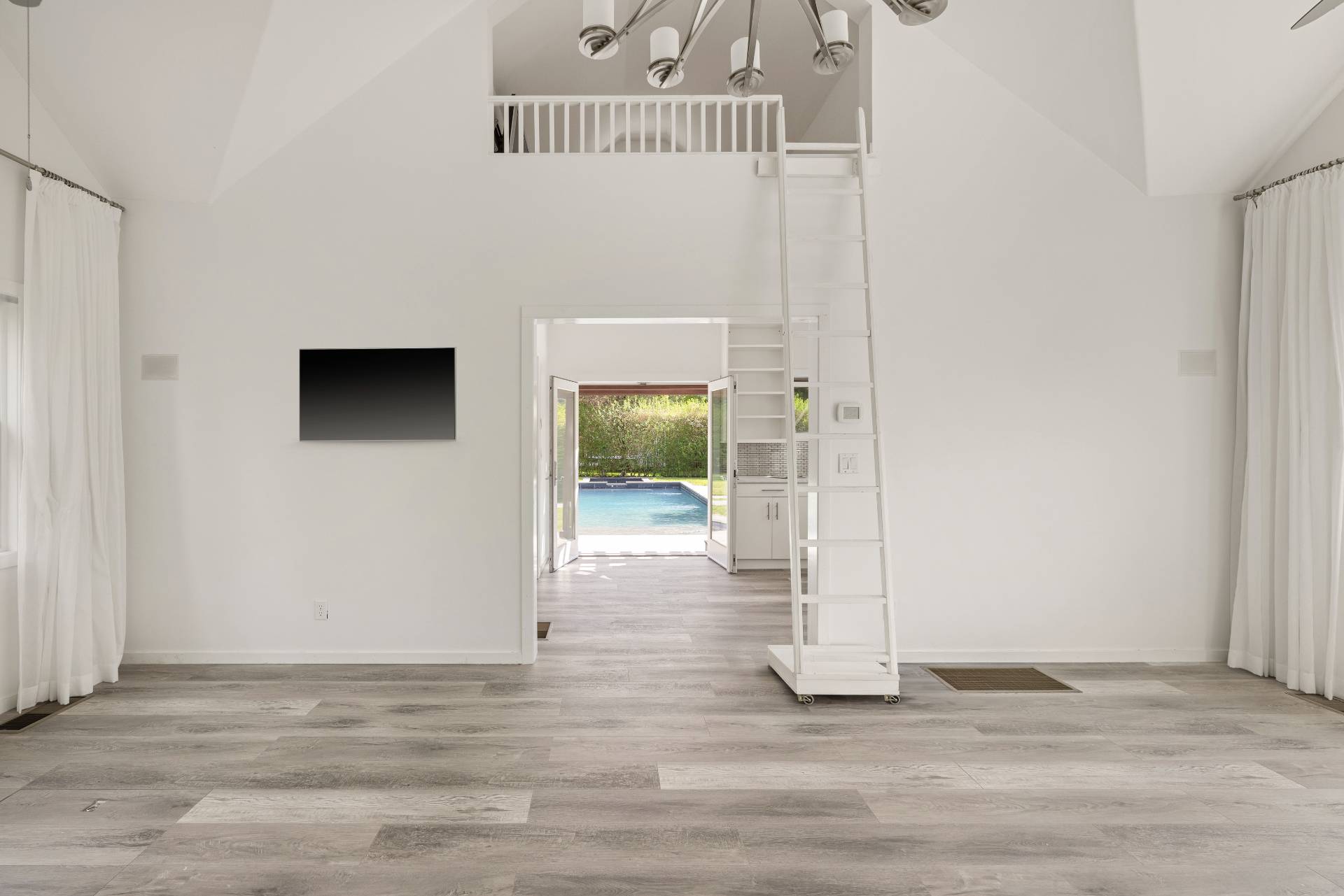 96 Audubon Avenue Bridgehampton, NY 11932 - Photo 21 of 25 a view of a livingroom with wooden floor
