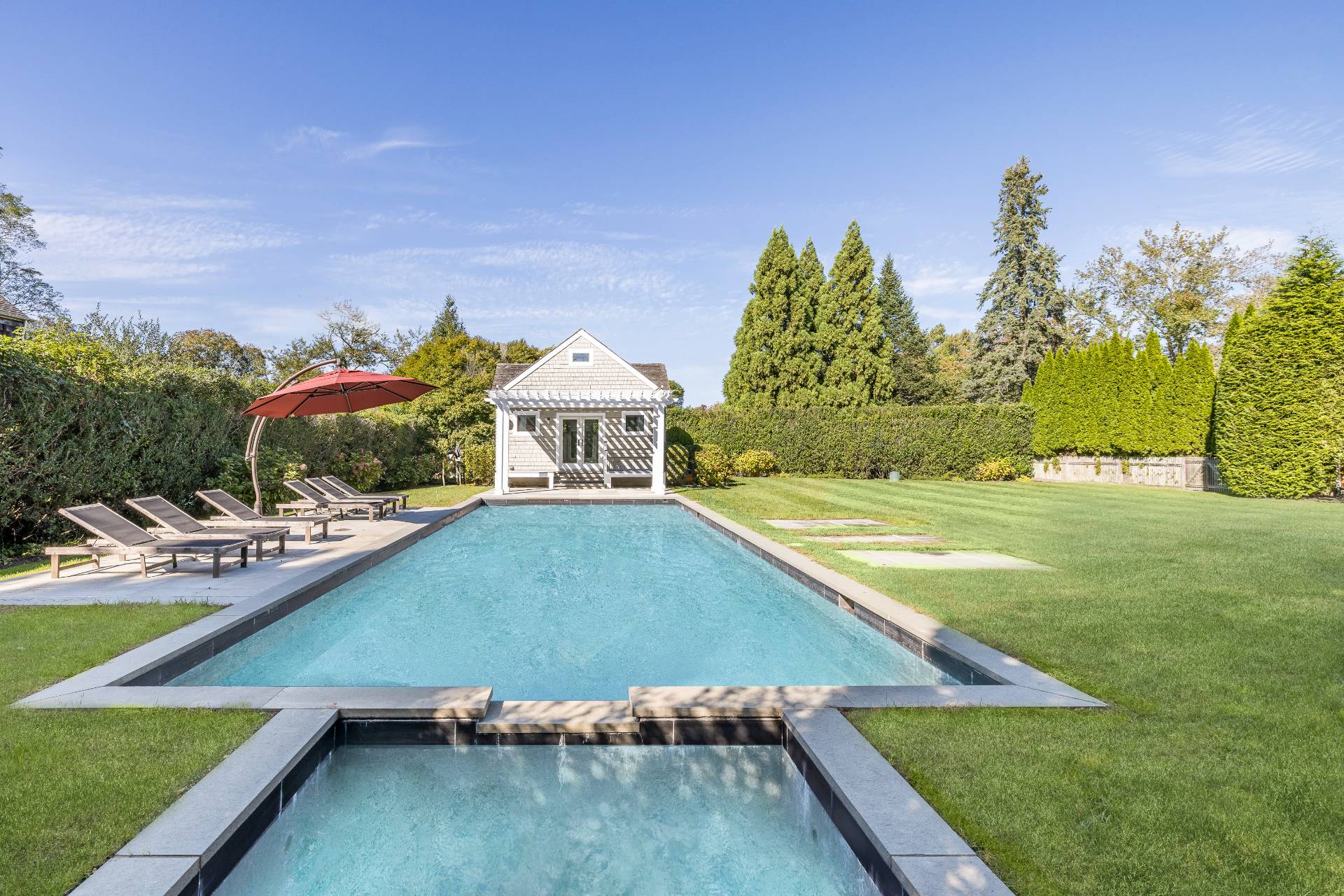 96 Audubon Avenue Bridgehampton, NY 11932 - Photo 3 of 25 a view of a house with swimming pool
