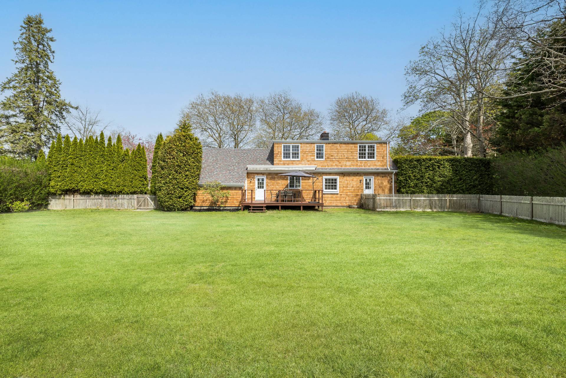 96 Audubon Avenue Bridgehampton, NY 11932 - Photo 8 of 25 a front view of a house with garden