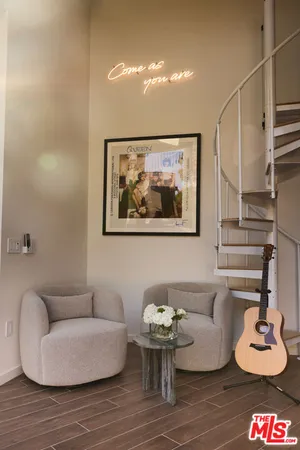 a room with furniture and chandelier
