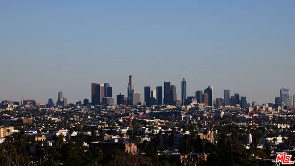 a view of a city with tall buildings