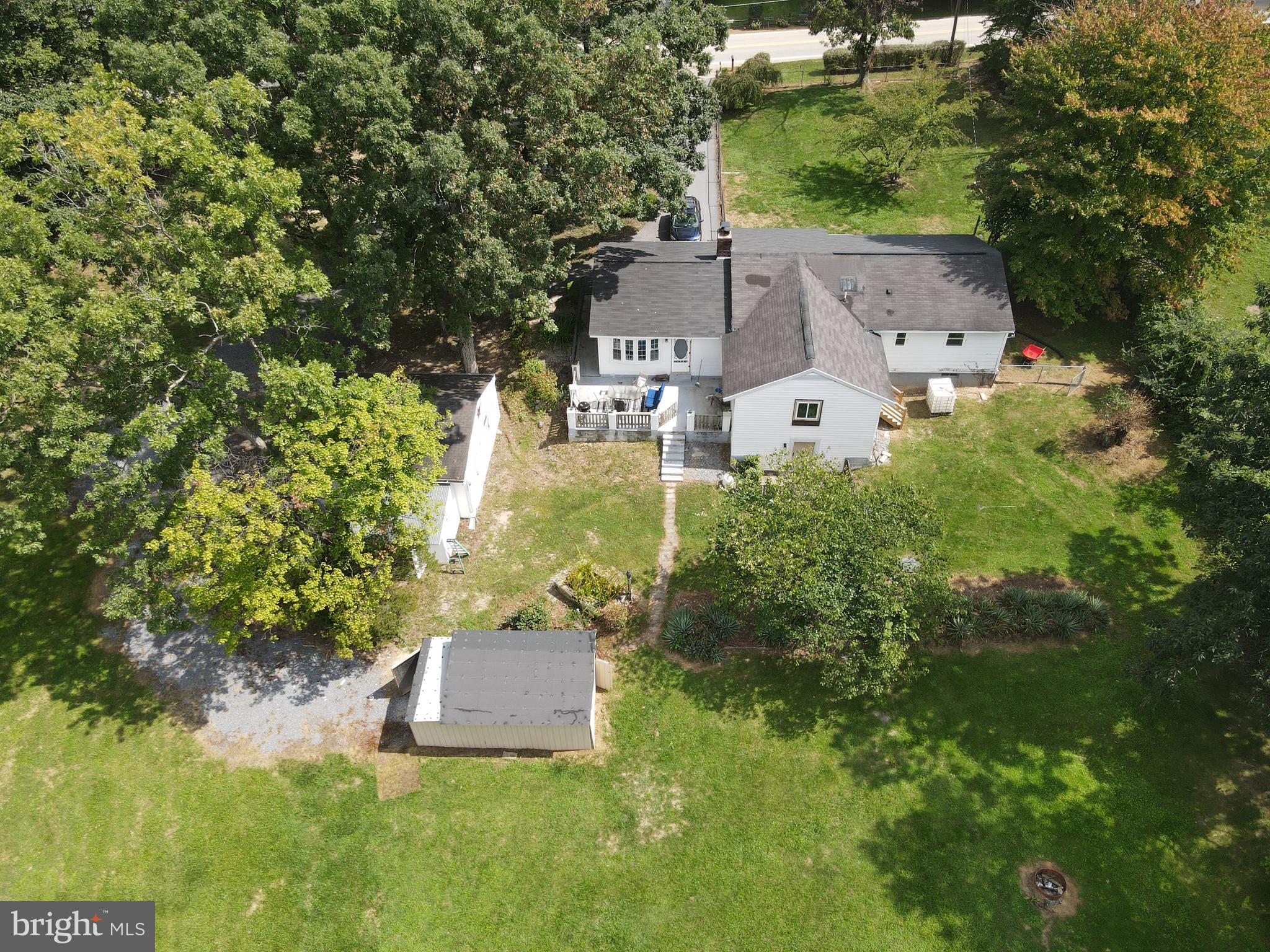 7120 Linganore Road Frederick, MD 21701 - Photo 24 of 26 Backyard, Shed, and home