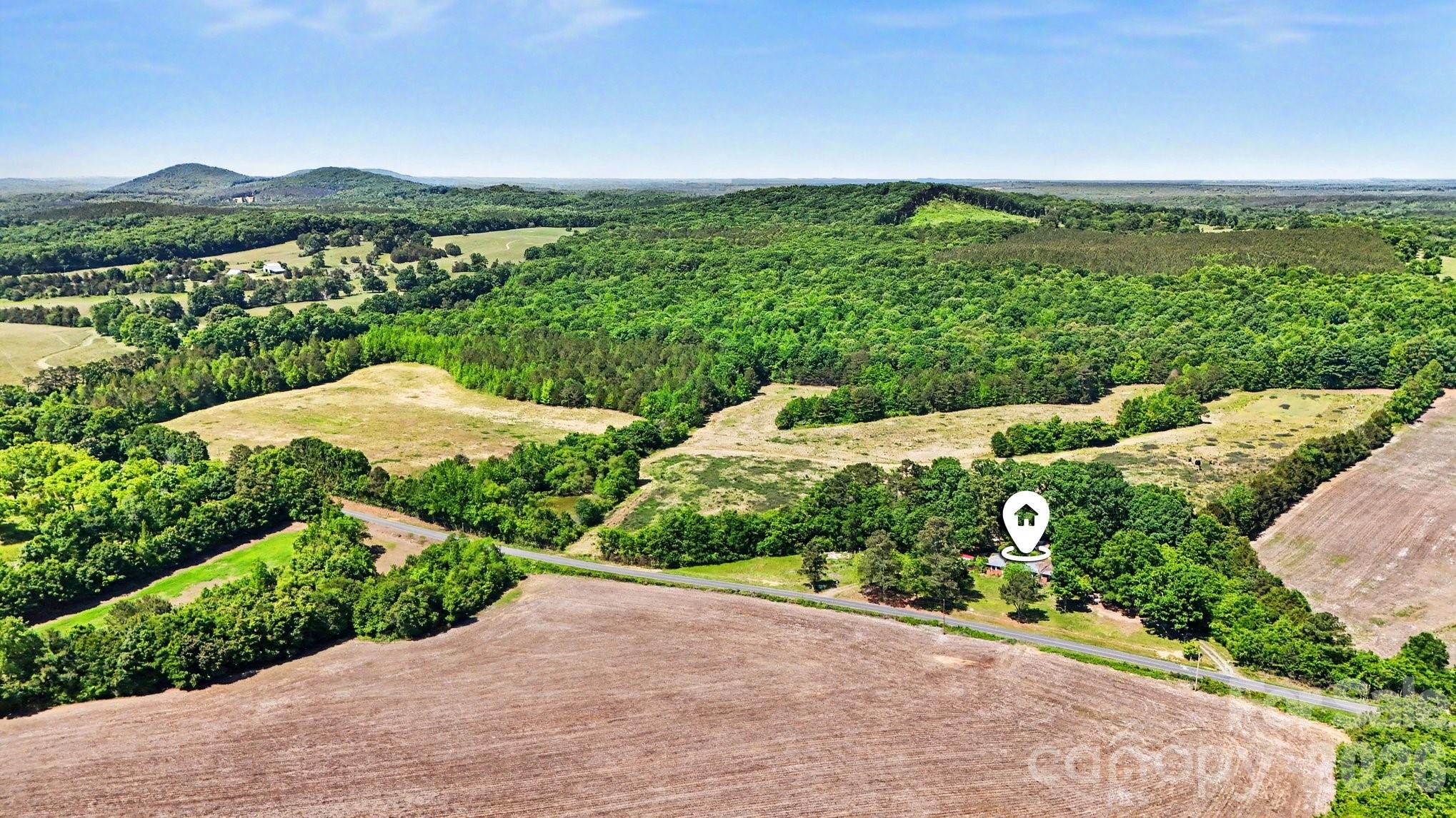 1832 Tysinger Road Denton, NC 27239 - Photo 21 of 21 a view of a garden with an ocean