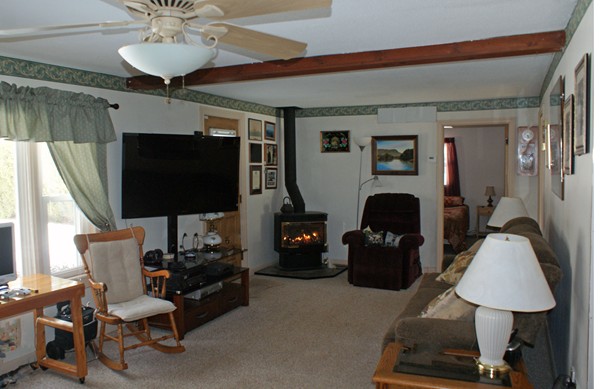 274 Loudville Road Easthampton, MA 01027 - Photo 6 of 30 a living room with furniture and a flat screen tv