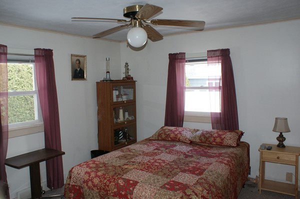 274 Loudville Road Easthampton, MA 01027 - Photo 7 of 30 a bedroom with a bed and a window