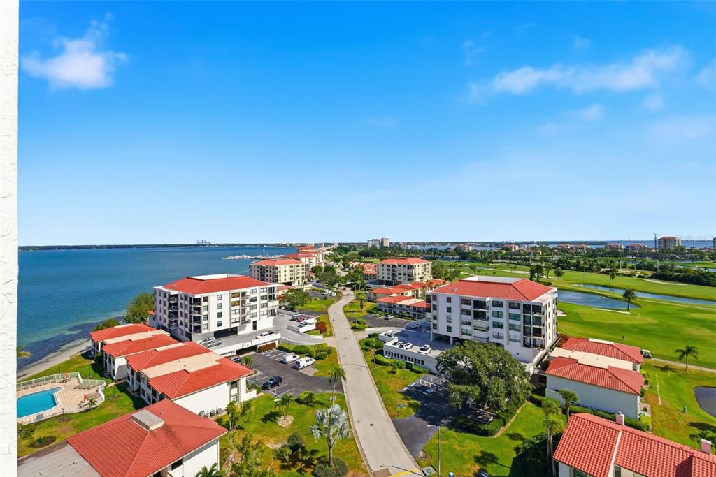 6265 Sun Boulevard, Unit 1204 St. Petersburg, FL 33715 - Photo 13 of 43 an aerial view of a houses with outdoor space