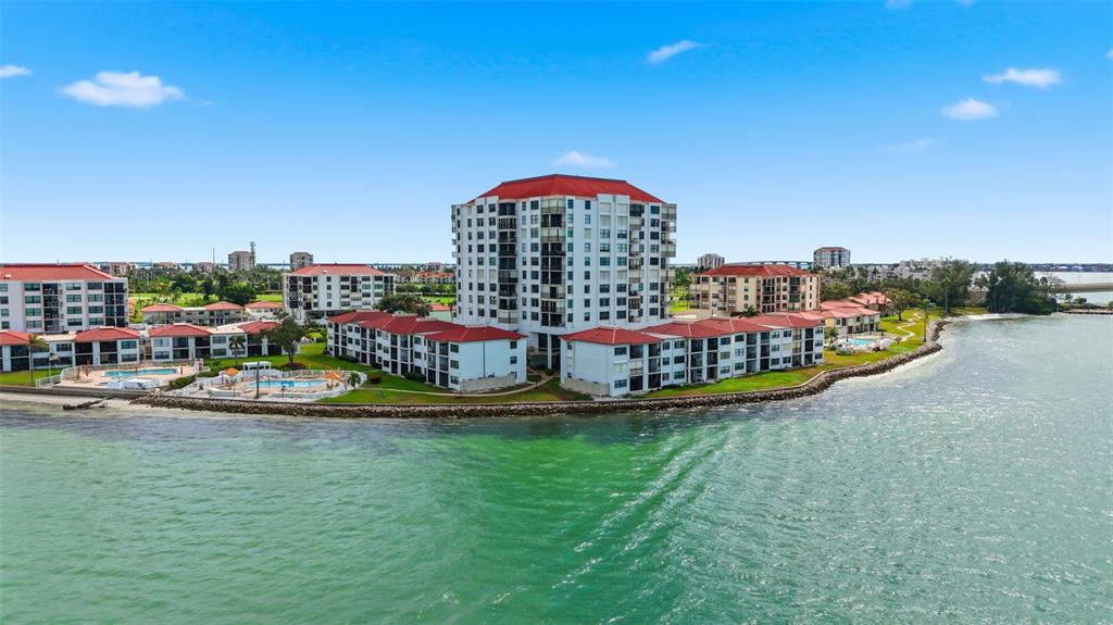 6265 Sun Boulevard, Unit 1204 St. Petersburg, FL 33715 - Photo 2 of 43 a view of a city with tall buildings in the background