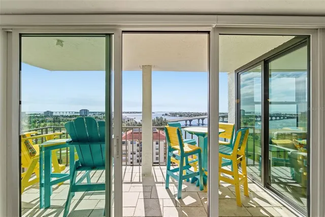 a view of a swimming pool with a lounge chairs
