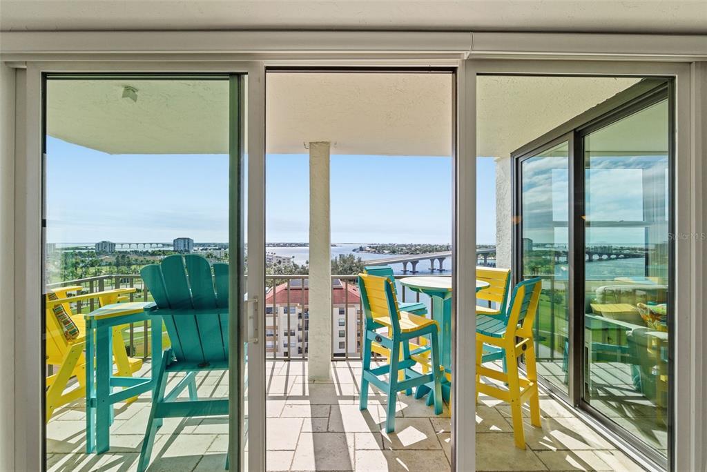 6265 Sun Boulevard, Unit 1204 St. Petersburg, FL 33715 - Photo 31 of 43 a view of a city from a balcony