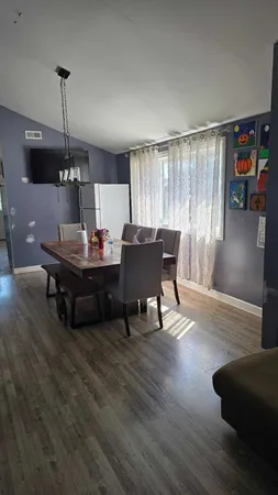 a bedroom with bed and window