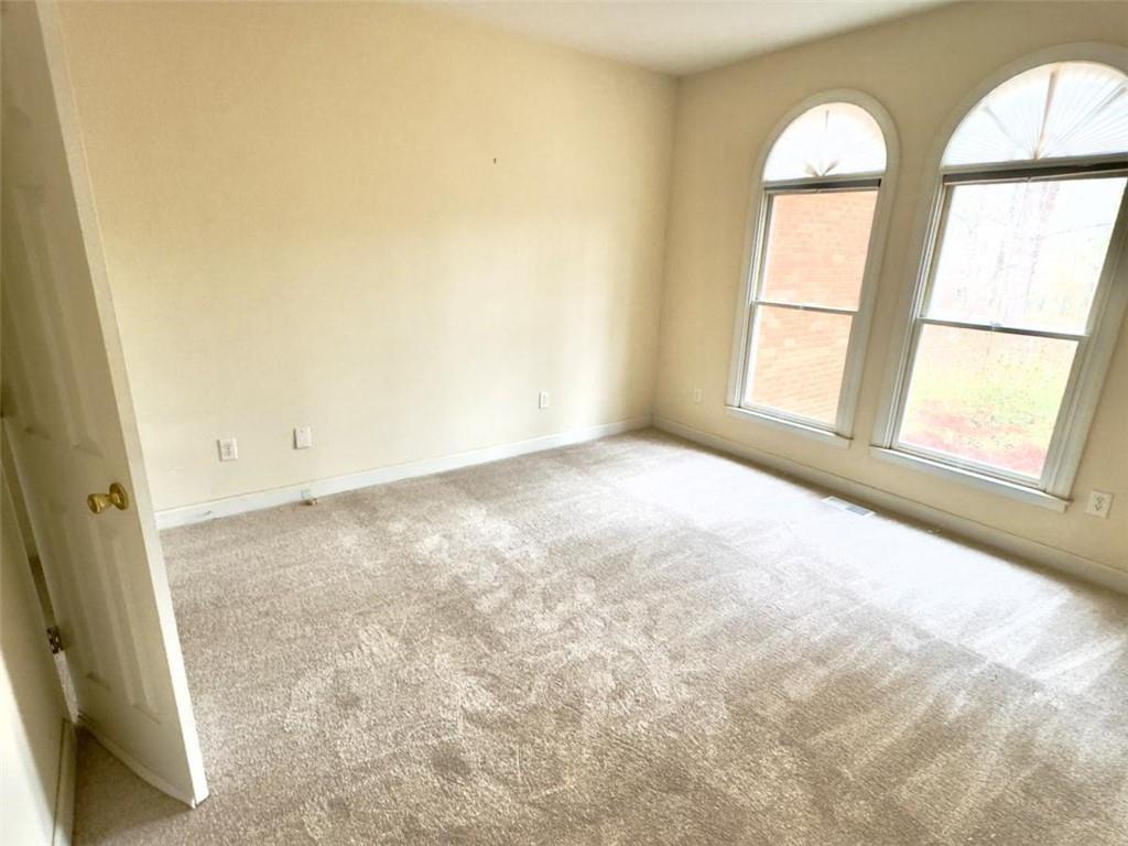 219 Deerhill Drive Bogart, GA 30622 - Photo 13 of 27 an empty room with windows