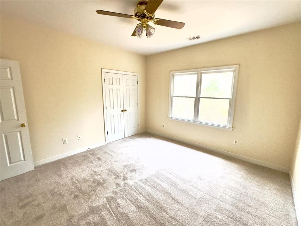 219 Deerhill Drive Bogart, GA 30622 - Photo 17 of 27 a view of an empty room with a window