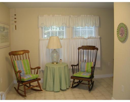 86 Maple Street Middleton, MA 01949 - Photo 15 of 24 a living room with furniture and a window