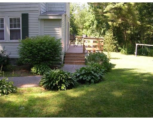 86 Maple Street Middleton, MA 01949 - Photo 24 of 24 a view of a backyard with potted plants