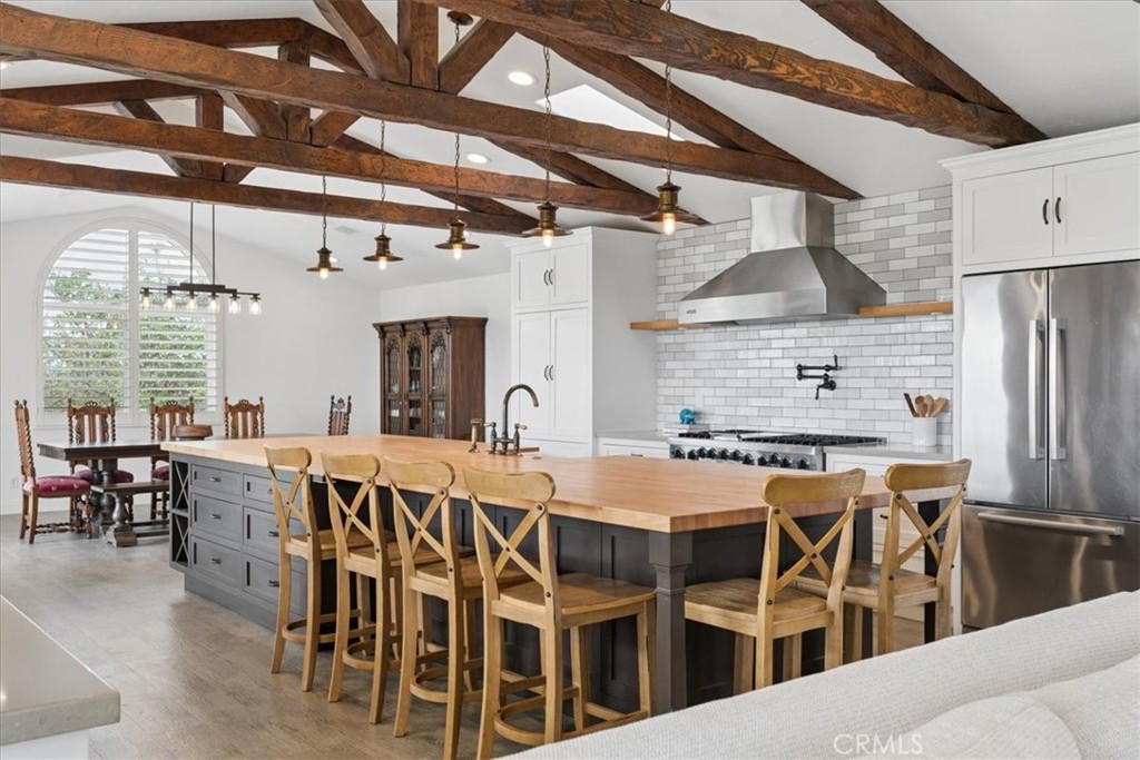5565 High Ridge Road Paso Robles, CA 93446 - Photo 15 of 73 a large kitchen with a table and chairs