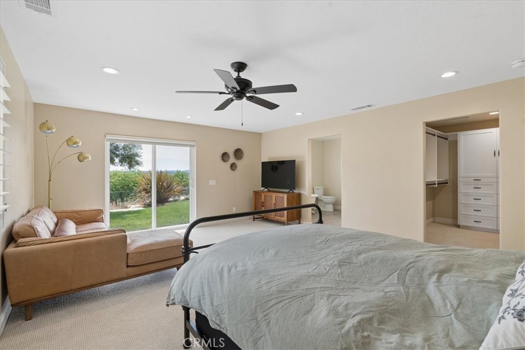 5565 High Ridge Road Paso Robles, CA 93446 - Photo 31 of 73 a bed room with a bed and a couch