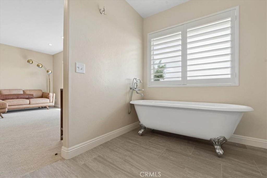 5565 High Ridge Road Paso Robles, CA 93446 - Photo 33 of 73 a bathroom with a bathtub and a shower