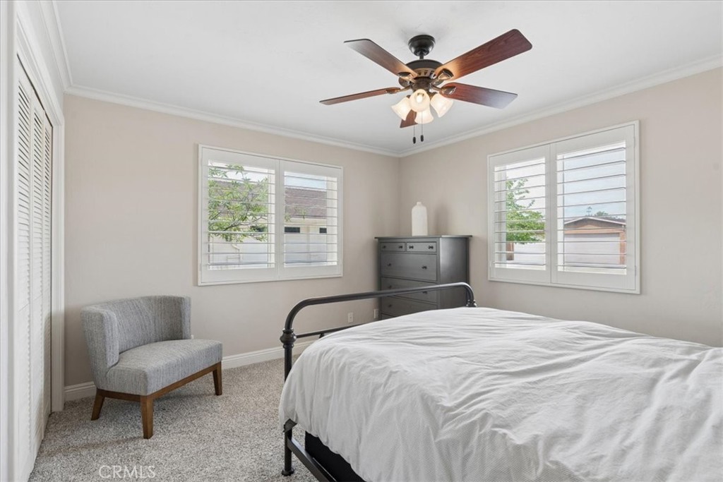 5565 High Ridge Road Paso Robles, CA 93446 - Photo 36 of 73 a bedroom with a bed a couch and a window