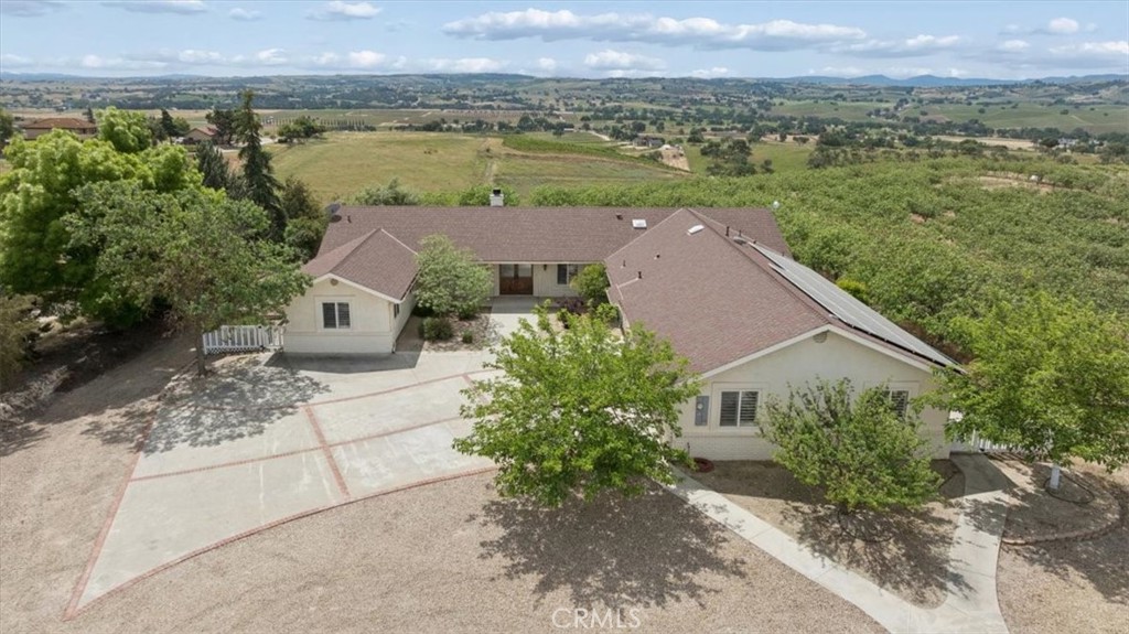 5565 High Ridge Road Paso Robles, CA 93446 - Photo 5 of 73 a aerial view of a house with a garden and lake view