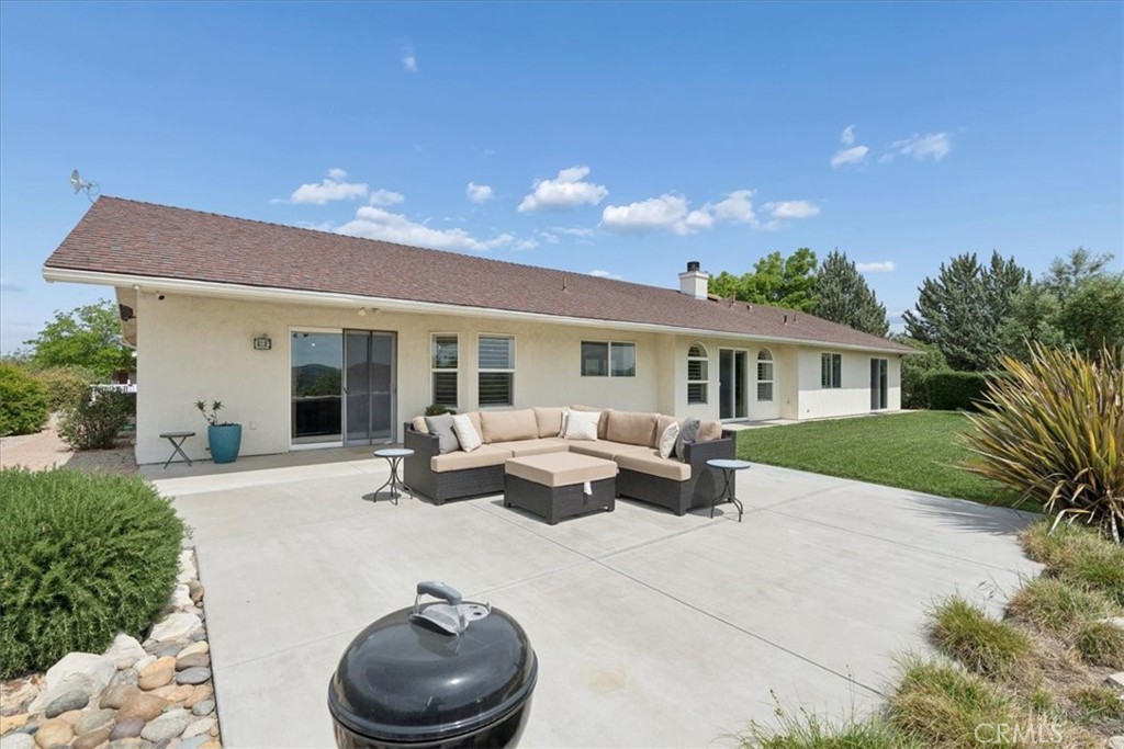 5565 High Ridge Road Paso Robles, CA 93446 - Photo 52 of 73 a view of a house with backyard and sitting area