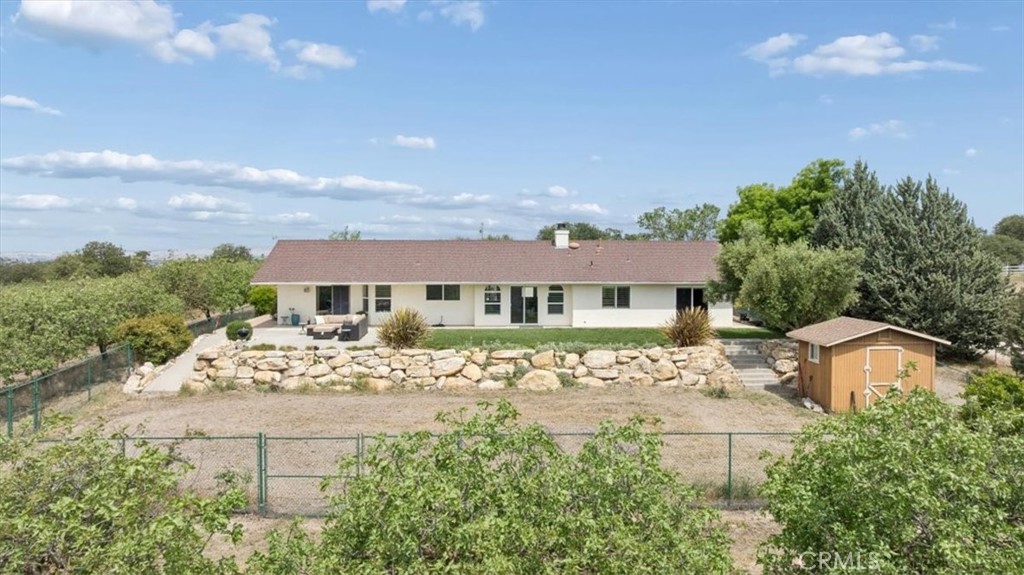 5565 High Ridge Road Paso Robles, CA 93446 - Photo 54 of 73 a front view of a house with a garden