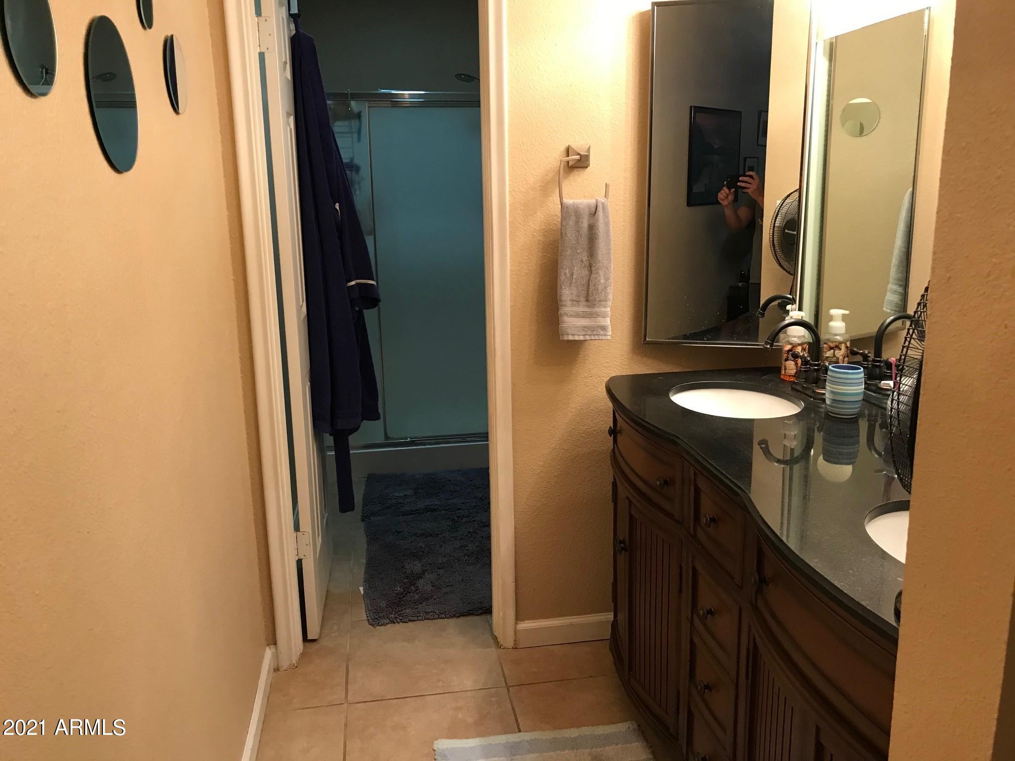 1024 East Pueblo Road Phoenix, AZ 85020 - Photo 8 of 9 a bathroom with a sink and a mirror