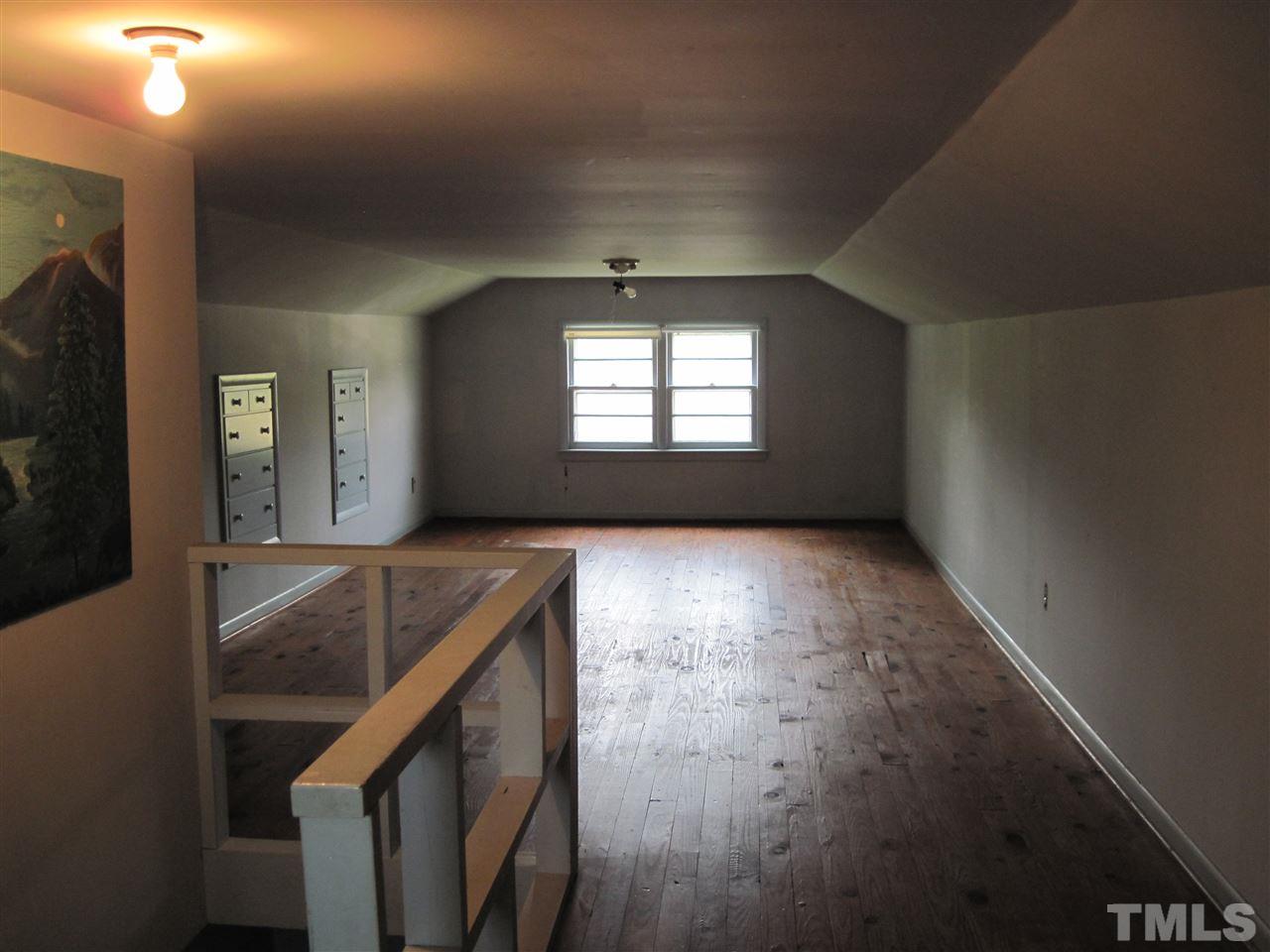 4009 St James Church Road Raleigh, NC 27604 - Photo 11 of 17 a view of livingroom with furniture and window