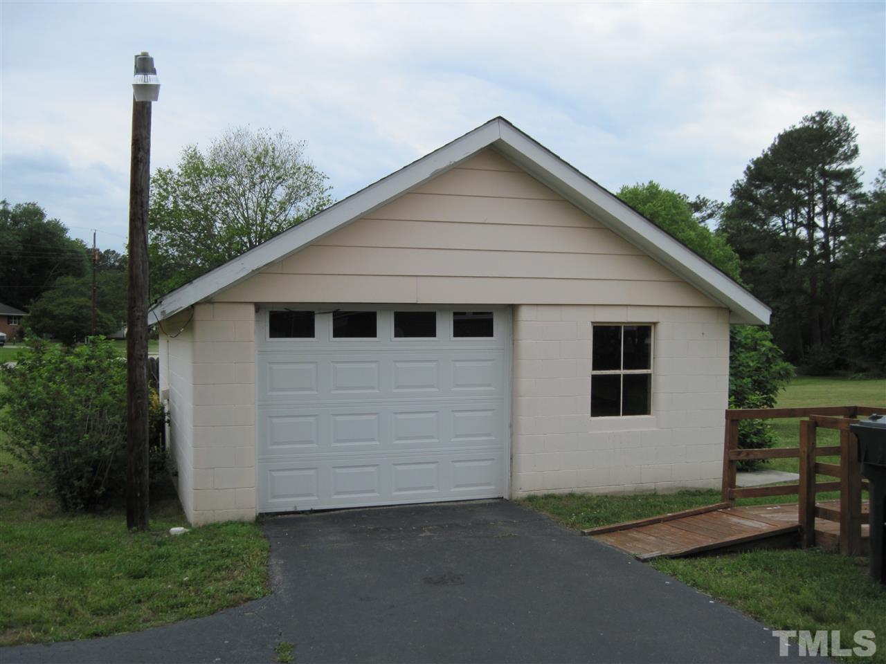 4009 St James Church Road Raleigh, NC 27604 - Photo 13 of 17 a view of a house with a yard