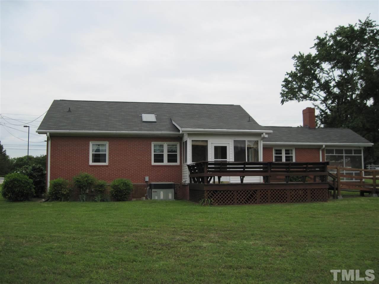 4009 St James Church Road Raleigh, NC 27604 - Photo 15 of 17 a house view with a garden space