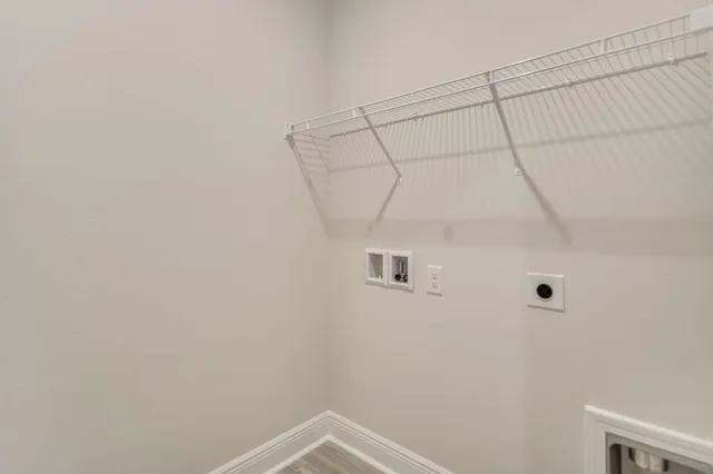 a view of a room with racks on the wall