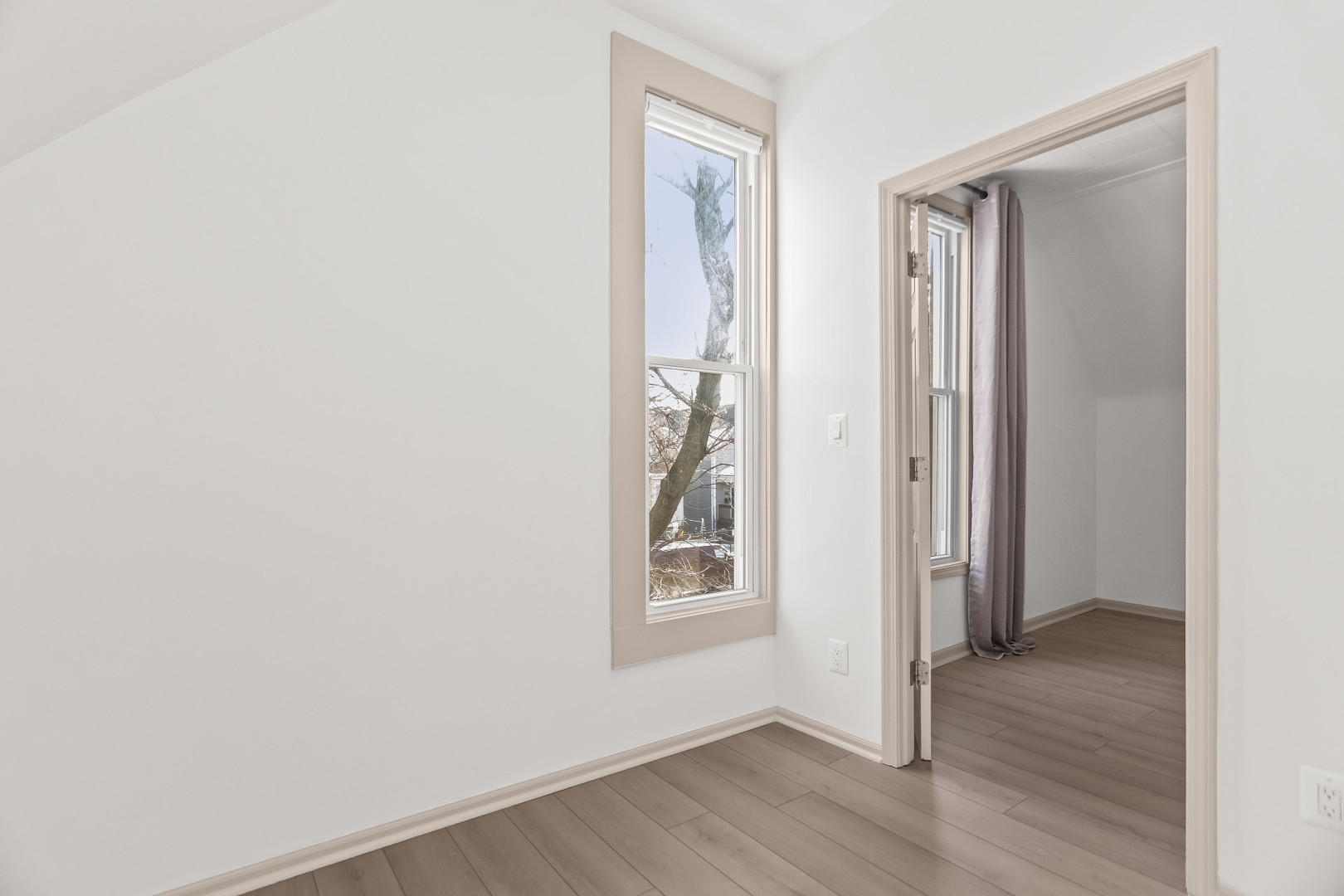 2846 North Troy Street, Unit 2 Chicago, IL 60618 - Photo 11 of 18 a view of an entryway with wooden floor