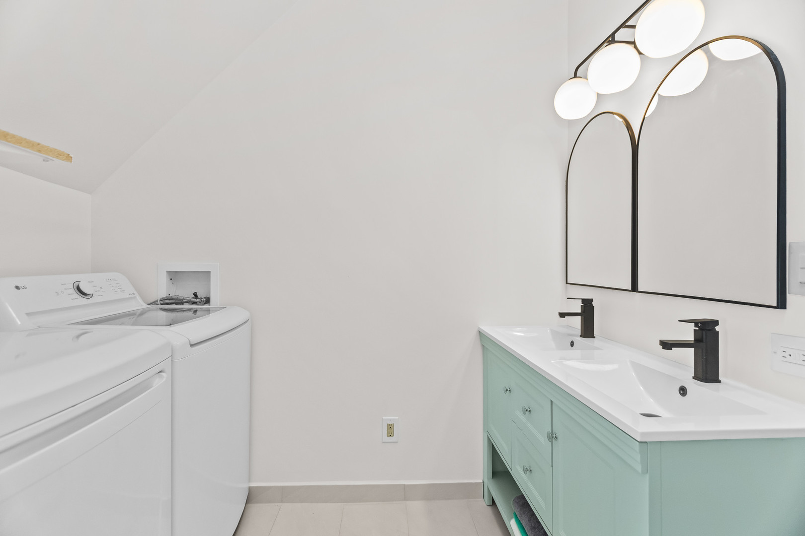 2846 North Troy Street, Unit 2 Chicago, IL 60618 - Photo 4 of 18 a bathroom with a sink and a mirror