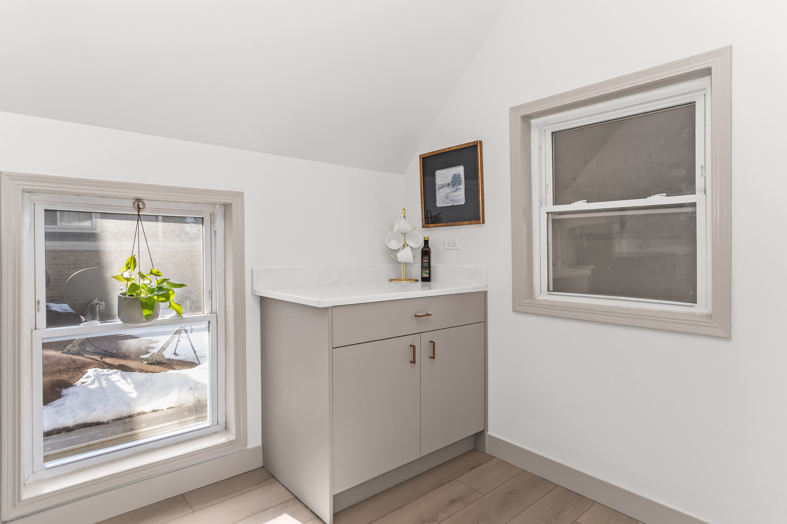 2846 North Troy Street, Unit 2 Chicago, IL 60618 - Photo 9 of 18 a bathroom with a sink and a window
